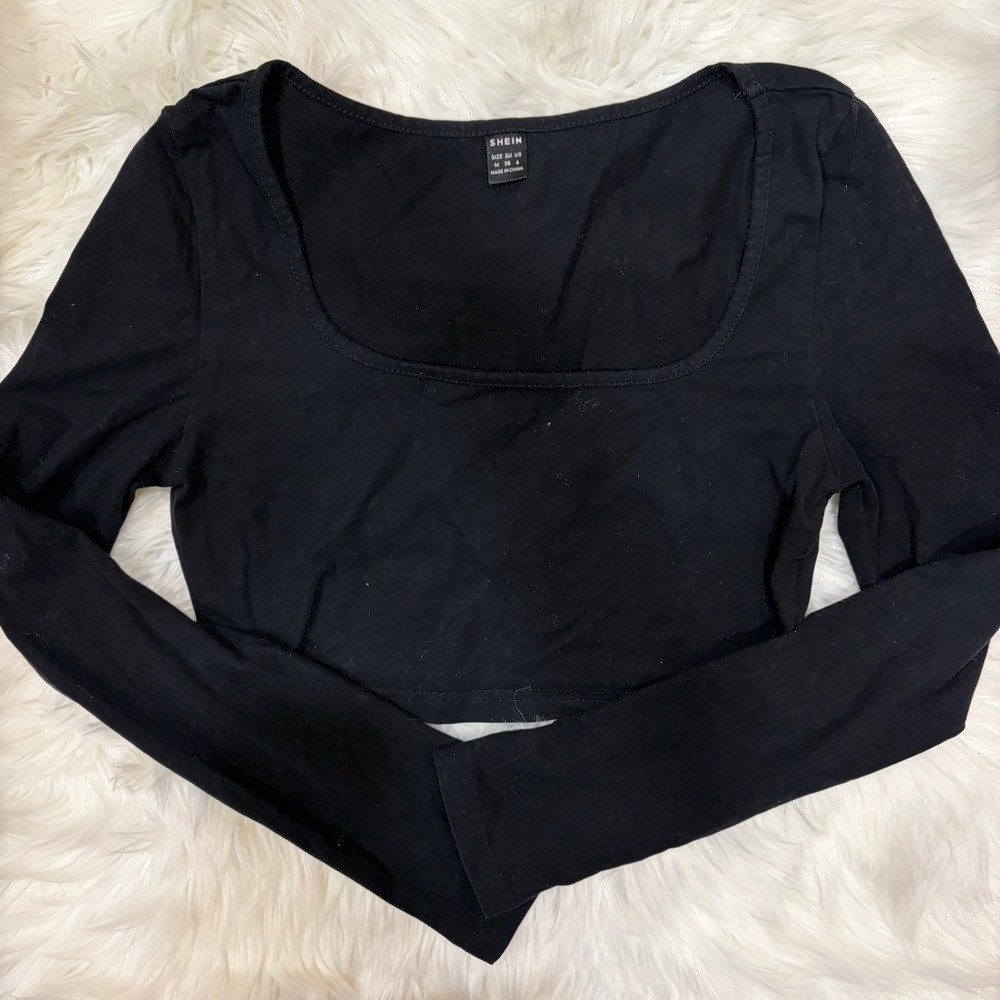 Black cropped long sleeve top